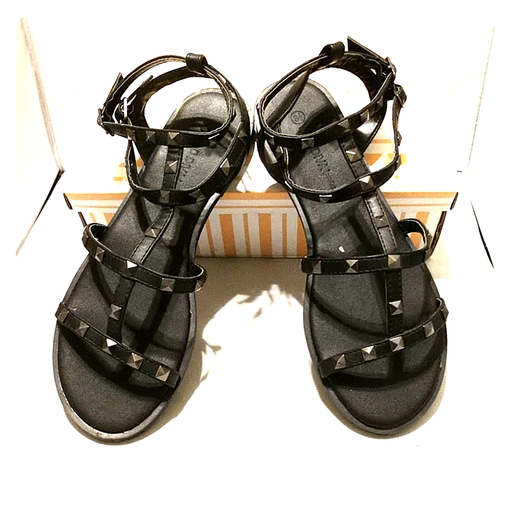 Black studded gladiator sandals